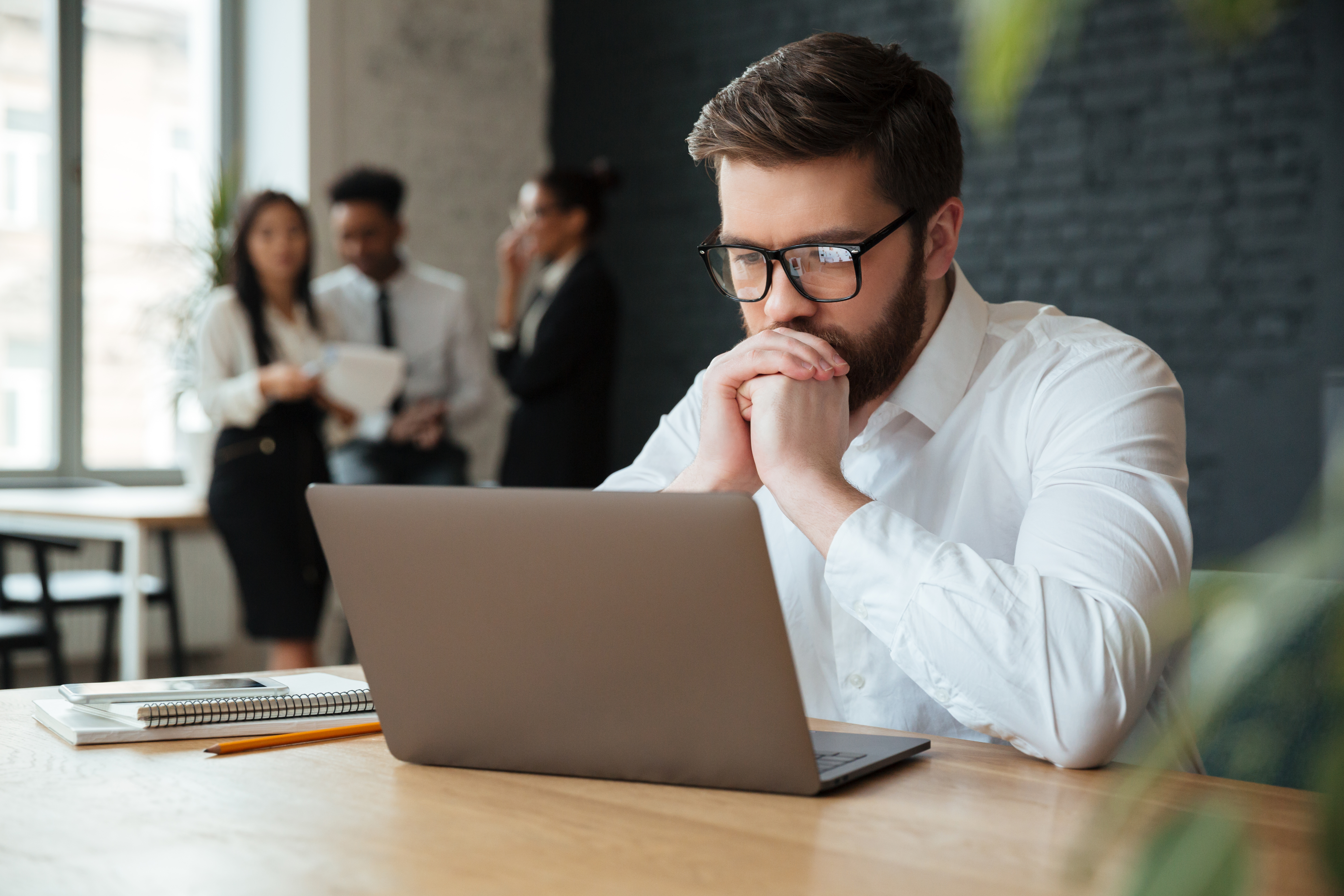 concentrated-young-caucasian-businessman
